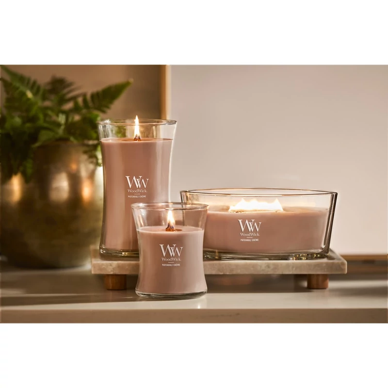 WoodWick®  Patchouli Créme közepes üveggyertya 275g