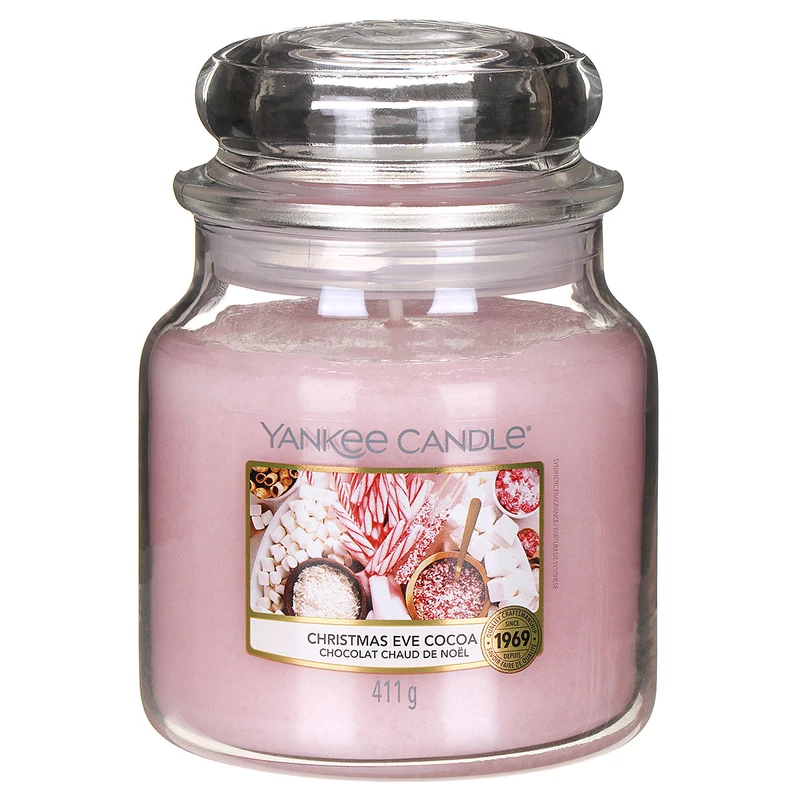 Yankee Candle® Christmas Eve Cocoa közepes üveggyertya